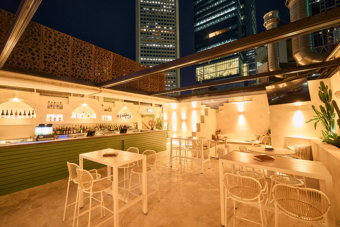 The Hotel Nacionale bar, showing seating and the customer-side of the bar. There are no people in this image. 